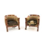 A pair of continental mahogany Empire style armchairs,