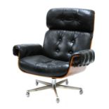 A black leather armchair,