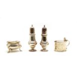 A four piece silver cruet,