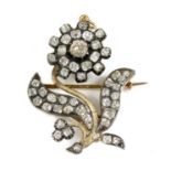 A late Georgian diamond set flower brooch/pendant,