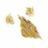 An 18ct gold diamond set brooch and earring suite by Andrew Grima, c.1970,