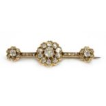 A late Victorian diamond cluster bar brooch,