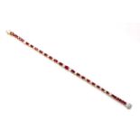 A ruby and diamond graduated line bracelet,