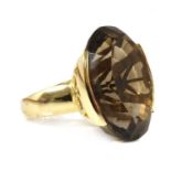 A gold single stone smoky quartz ring,