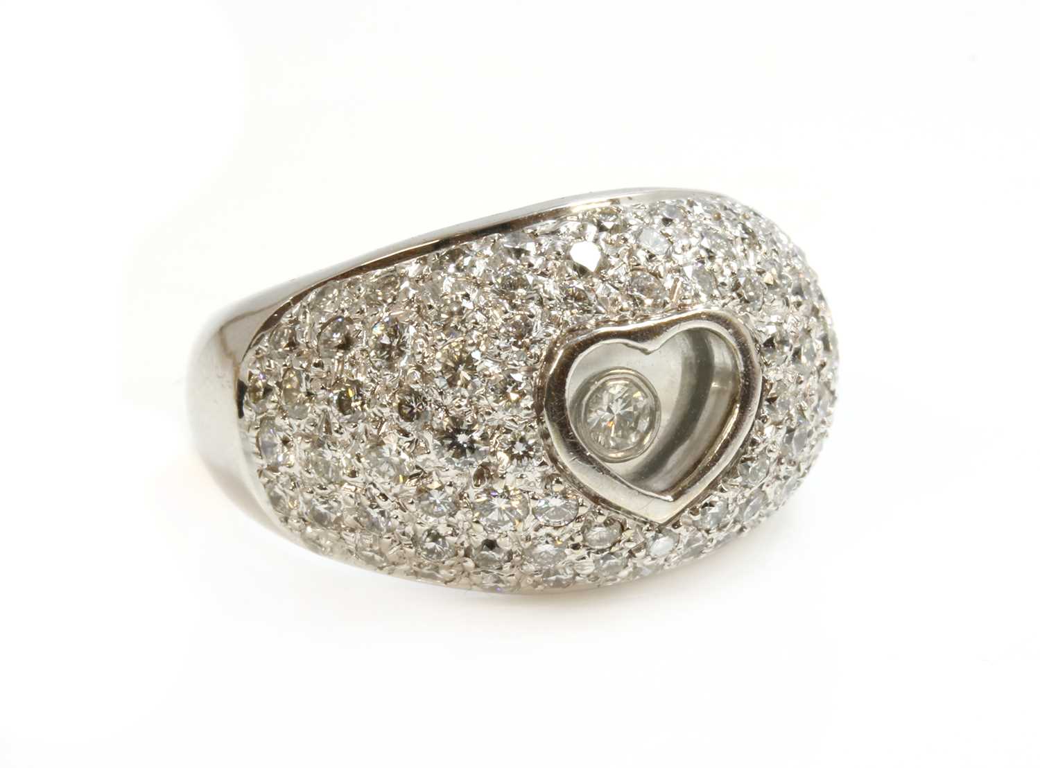 An 18ct white gold diamond set bombé ring,