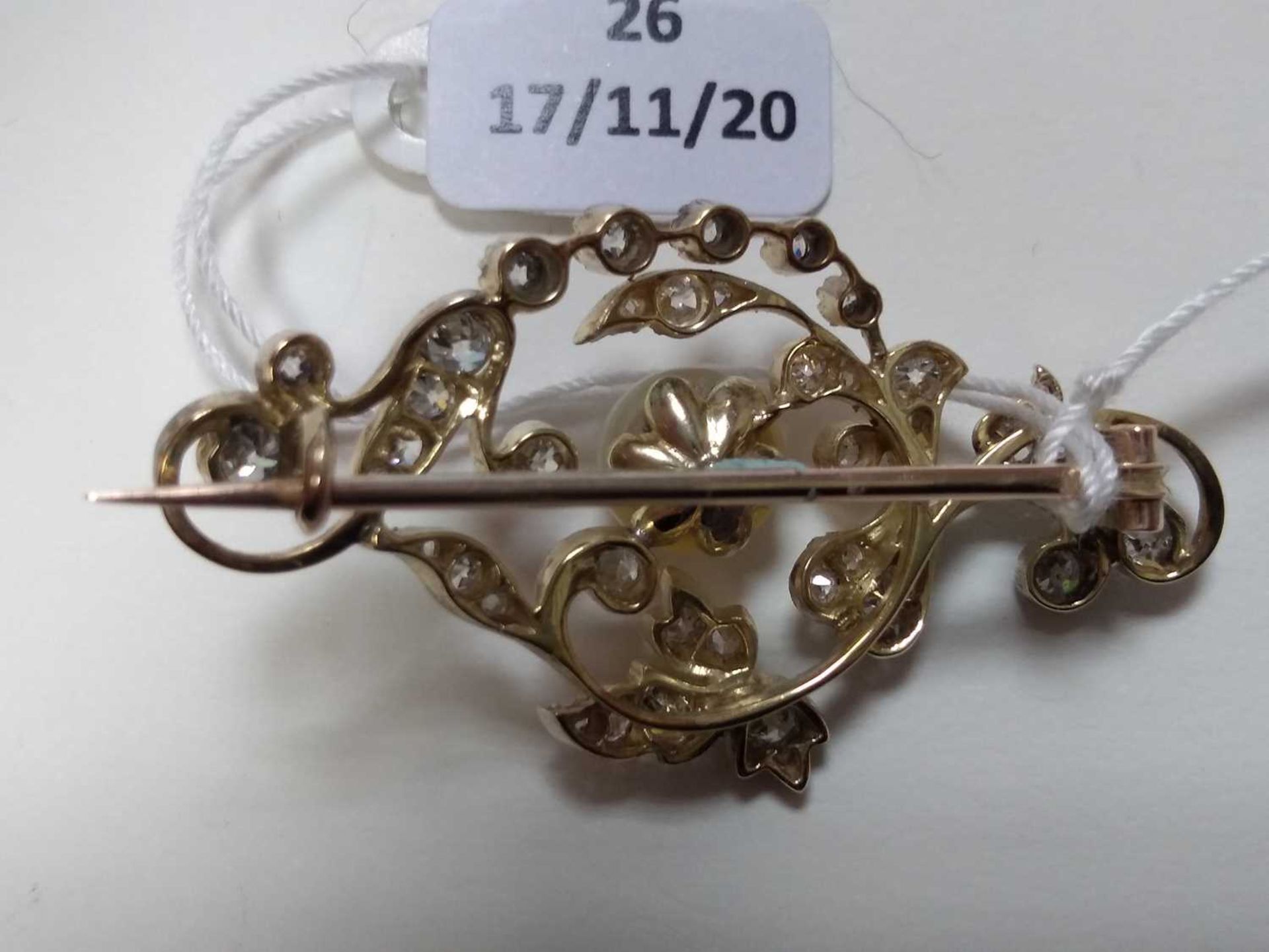 A late Victorian pearl and diamond scrolling brooch, - Image 5 of 5