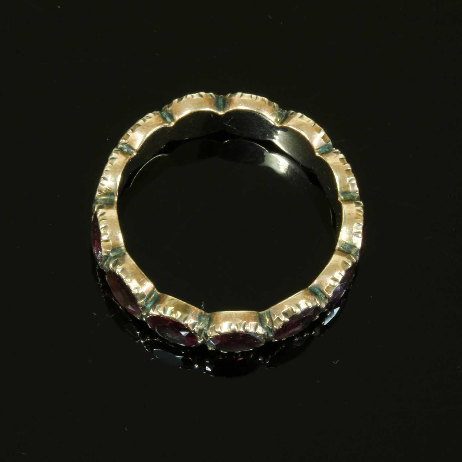 A Georgian foil-backed flat cut garnet eternity-style ring, - Image 3 of 7
