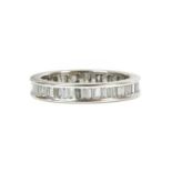 An 18ct white gold diamond set full eternity ring,