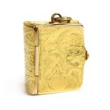 A Victorian rectangular hinged locket of book form,