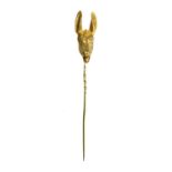 A gold donkey or ass novelty stick pin, late 19th century or early 20th century,