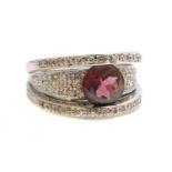 An Italian white gold rhodolite garnet and diamond ring,