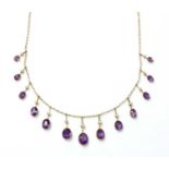 An Edwardian amethyst and split pearl fringe necklace,