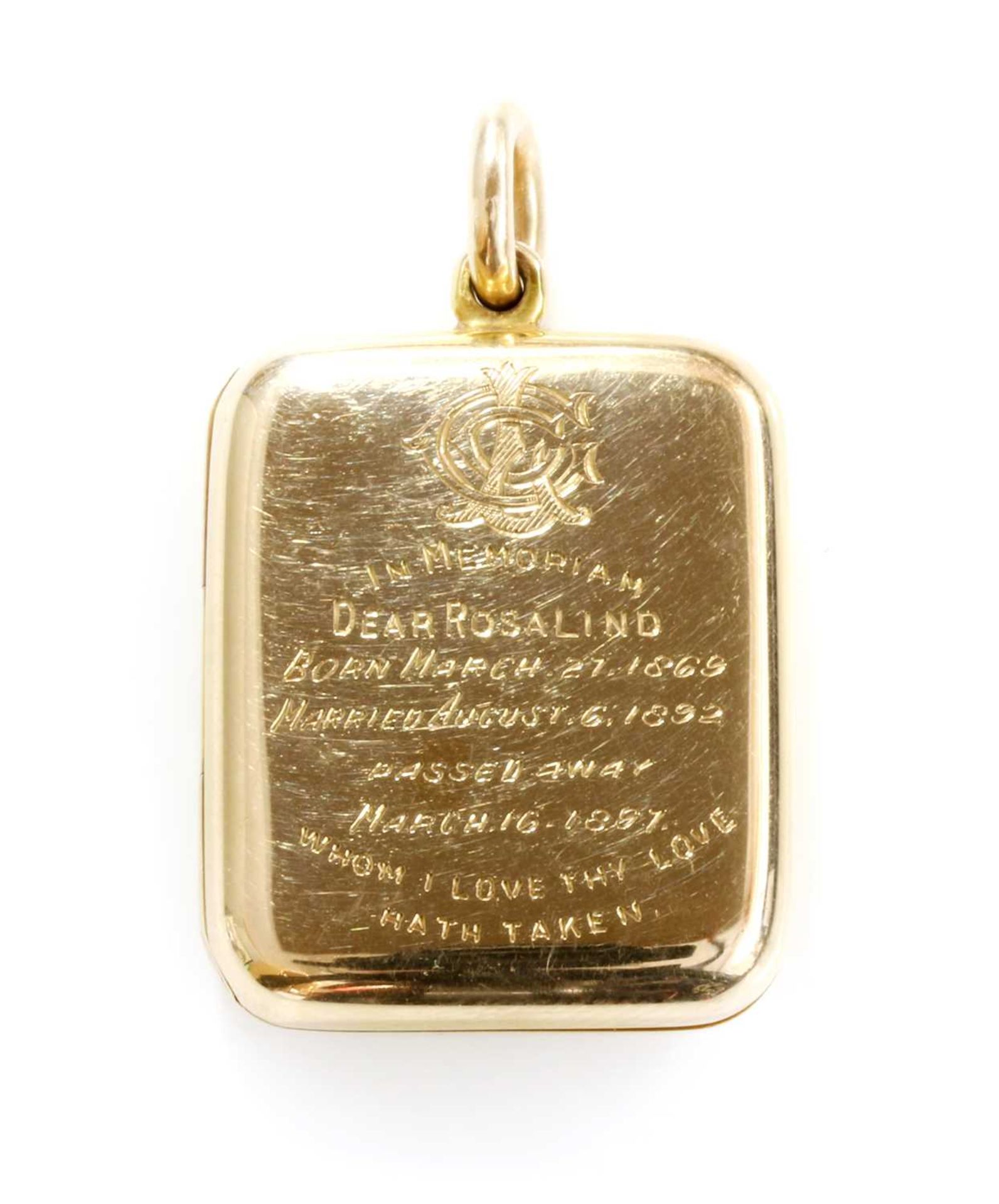 A late Victorian gold rectangular cushion-shaped hinged locket,