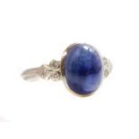 A single stone cabochon sapphire ring,