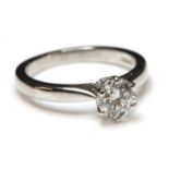 A platinum single stone diamond ring,