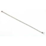 An 18ct white gold diamond set Mirage line bracelet,