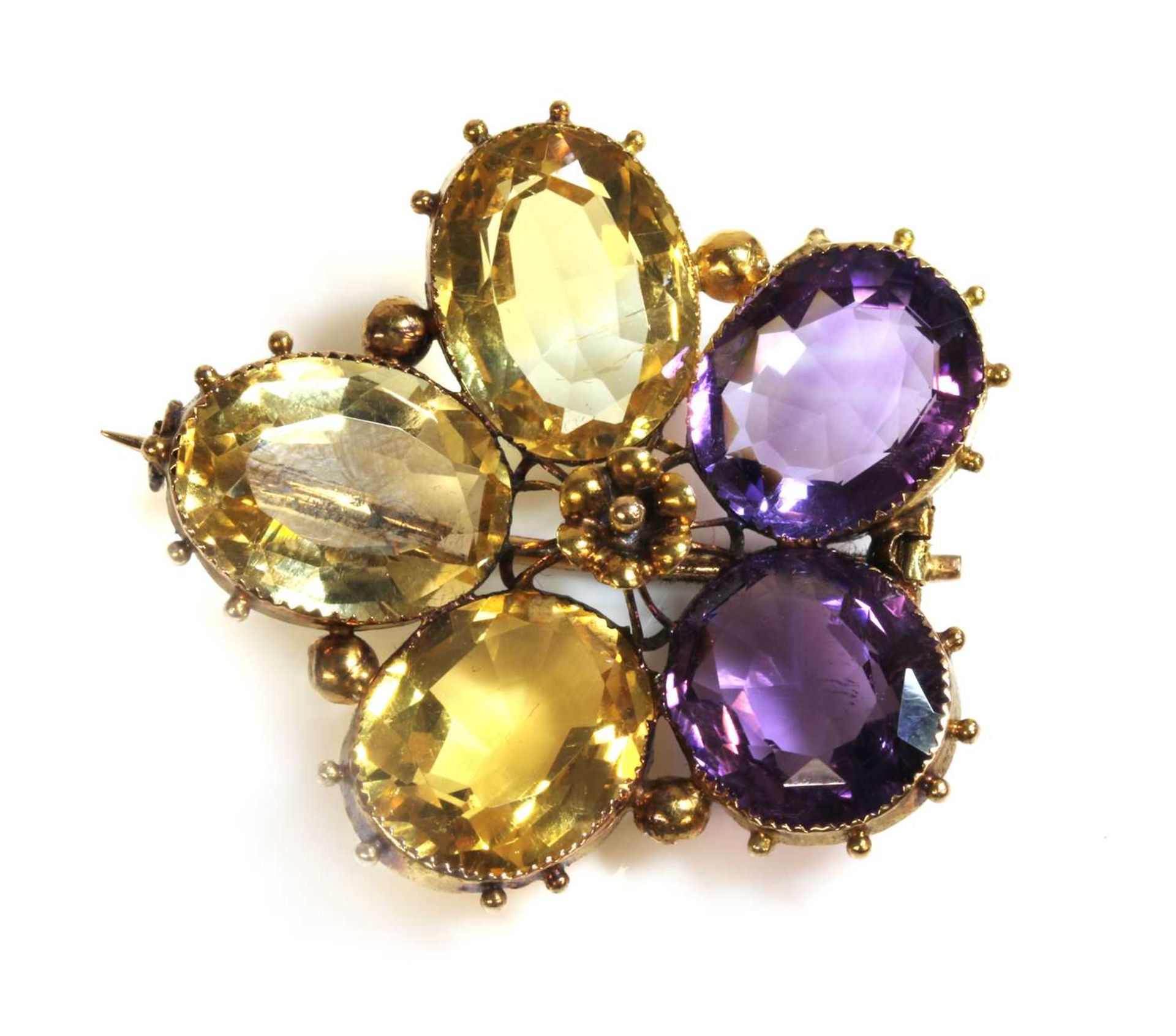 A Victorian gold amethyst and citrine pansy brooch,