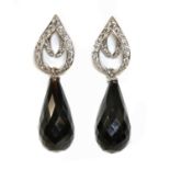 A pair of 18ct white gold diamond and onyx set drop earrings by Susy Telling,