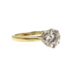 An 18ct yellow and white gold single stone ring,