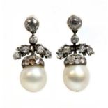 A pair of late Victorian pearl and diamond acorn drop earrings,