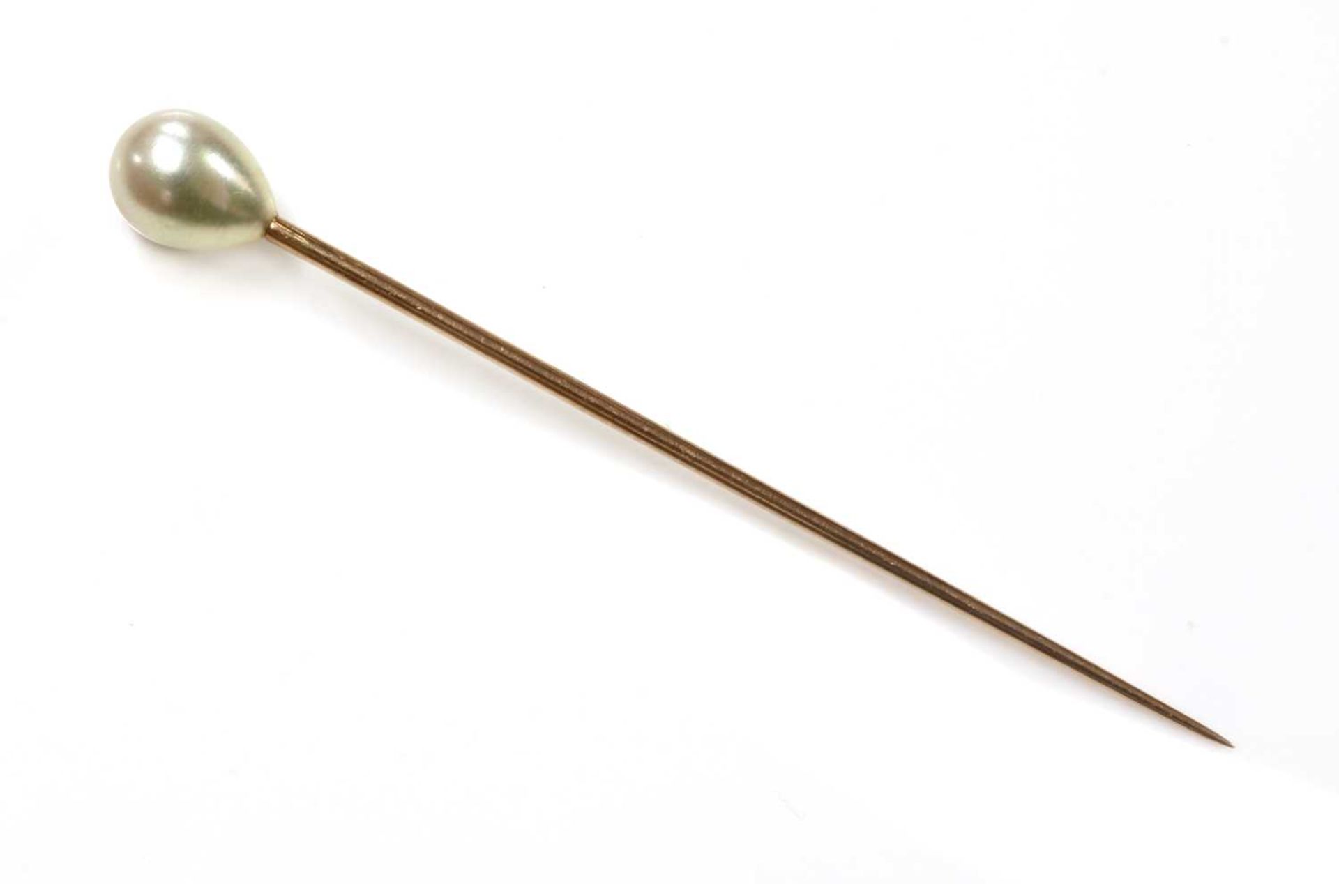 A single stone pearl stick pin,
