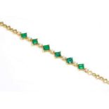 An 18ct gold emerald and diamond bracelet,