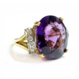 An 18ct yellow and white gold single stone amethyst ring,