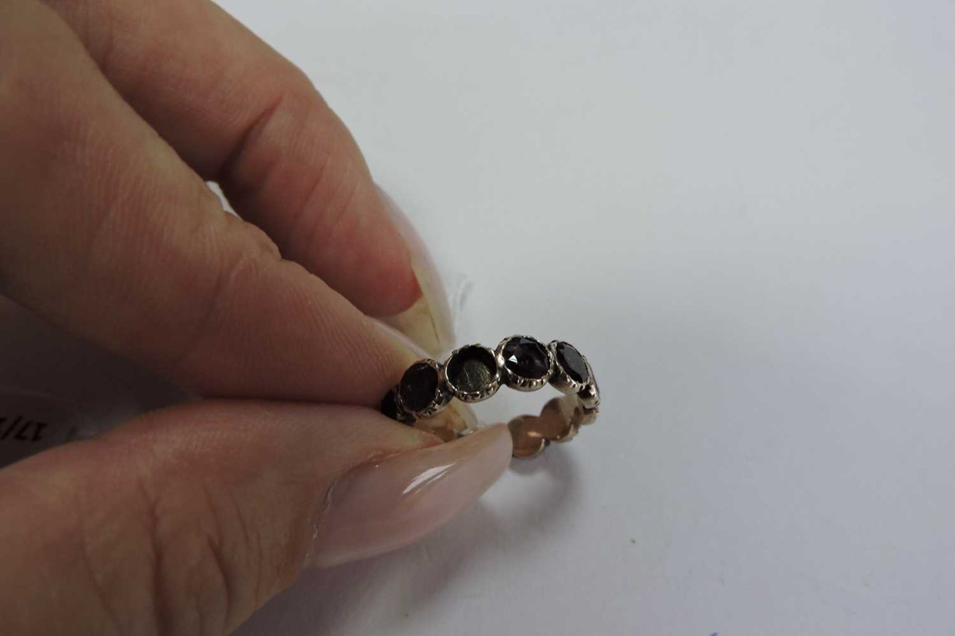 A Georgian foil-backed flat cut garnet eternity-style ring, - Image 6 of 7