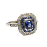 A white gold sapphire and diamond octagonal target-style cluster ring,