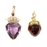 A Victorian gold garnet pendant,