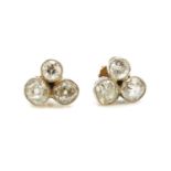 A pair of trefoil diamond cluster stud earrings,