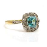 A blue zircon and diamond rectangular cluster ring,