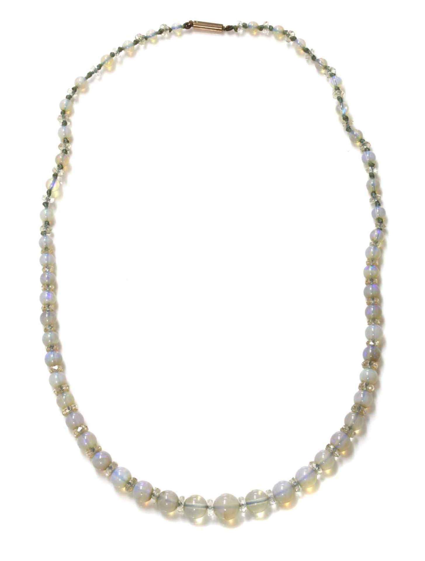 A single row graduated opal and glass bead necklace,