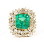 A gold Colombian emerald and diamond cluster ring,