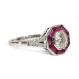 A white gold diamond and ruby octagonal-shaped target cluster ring,