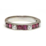 A diamond and ruby half eternity ring,