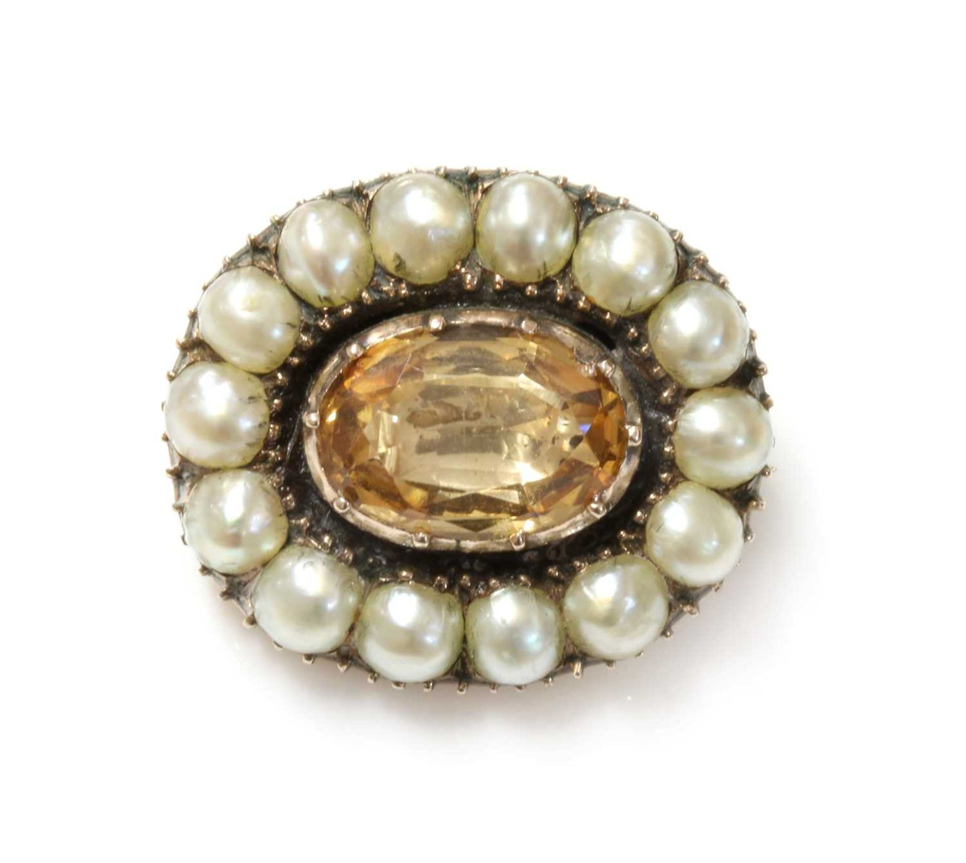 A Georgian foiled topaz and split pearl brooch,