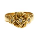 An 18ct gold diamond set knot ring by Henry Williamson Ltd., c.1916,