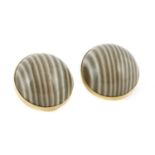 A pair of circular gold polished flint earrings,