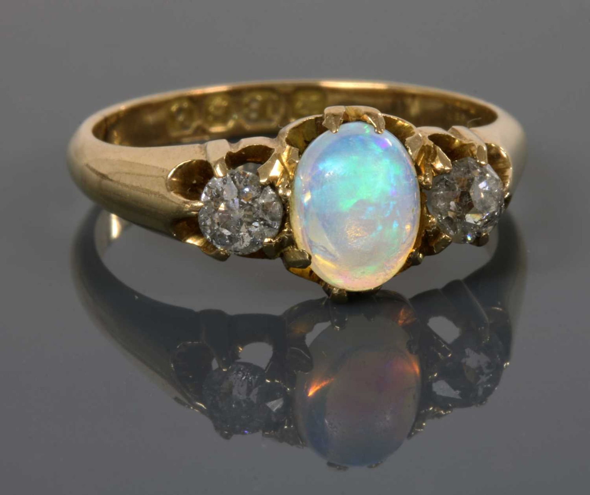An 18ct gold late Victorian three stone opal and diamond ring, - Image 2 of 2