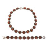 A Danish sterling silver amber set necklace and bracelet suite by Niels Erik From,