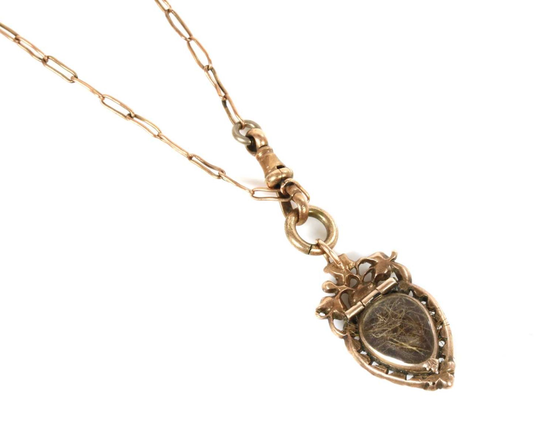 A Georgian heart-shaped split pearl glazed locket,