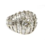A 14ct white gold diamond set bombé ring,