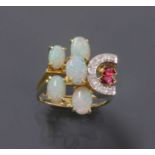 A Continental opal, ruby and diamond asymmetrical cluster ring, c.1970,