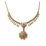 A late Victorian gold, split pearl, fringe and star pendant necklace, c.1900,