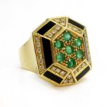 An Italian emerald, diamond and black enamel ring, with an octagonal domed head, c.1960,