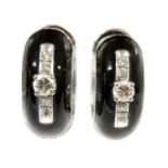 A pair of white gold diamond and black enamel hinged hoop earrings,