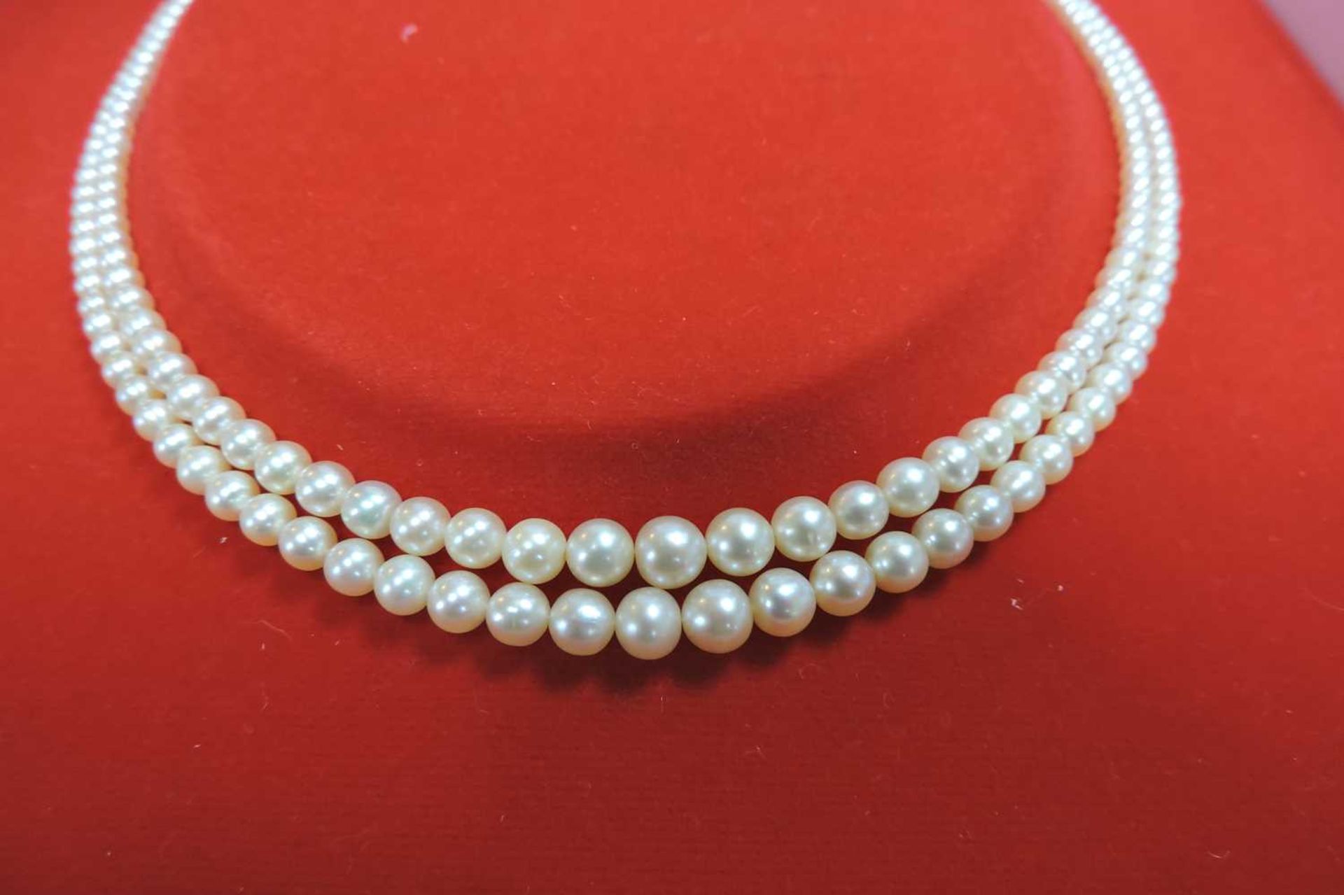 A cased two row graduated natural pearl necklace, - Image 6 of 7