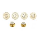 A cased matched set of two dress studs and four gold mother-of-pearl, pearl and enamel buttons,