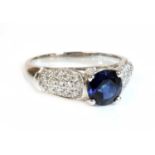 A Continental white gold single stone sapphire ring,